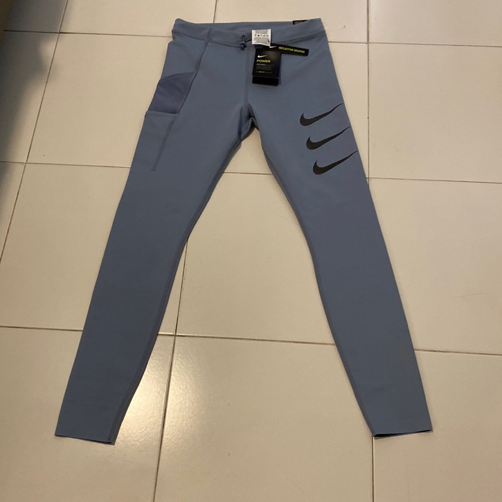 NIKE Power brand new with tags Epic Luxe tight fit.